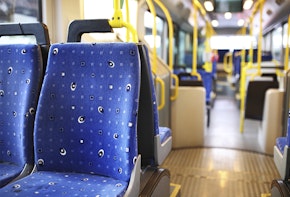 Empty bus with blue seat covers