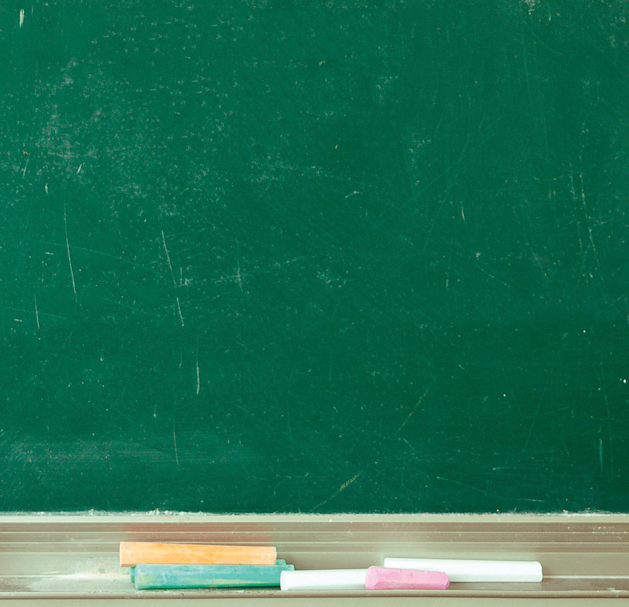 a green chalkboard with a toothbrush and toothpaste on it