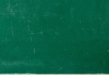 a green chalkboard with a toothbrush and toothpaste on it