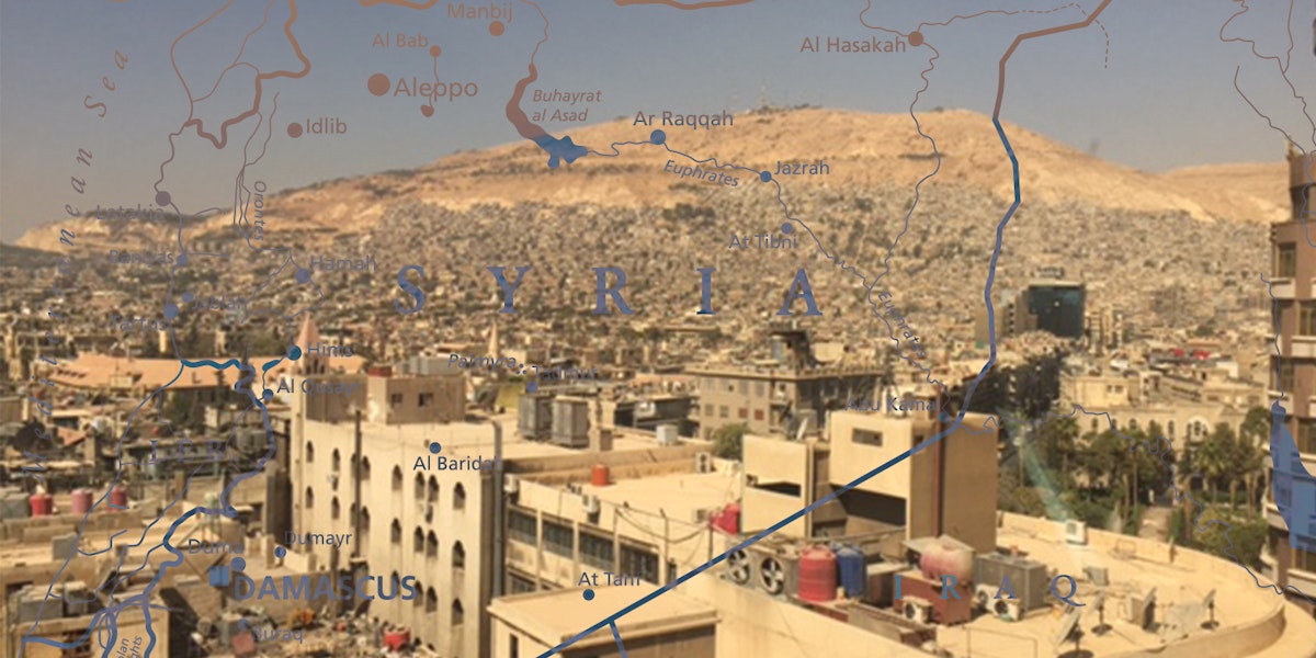 a map of a city with buildings and a mountain in the background