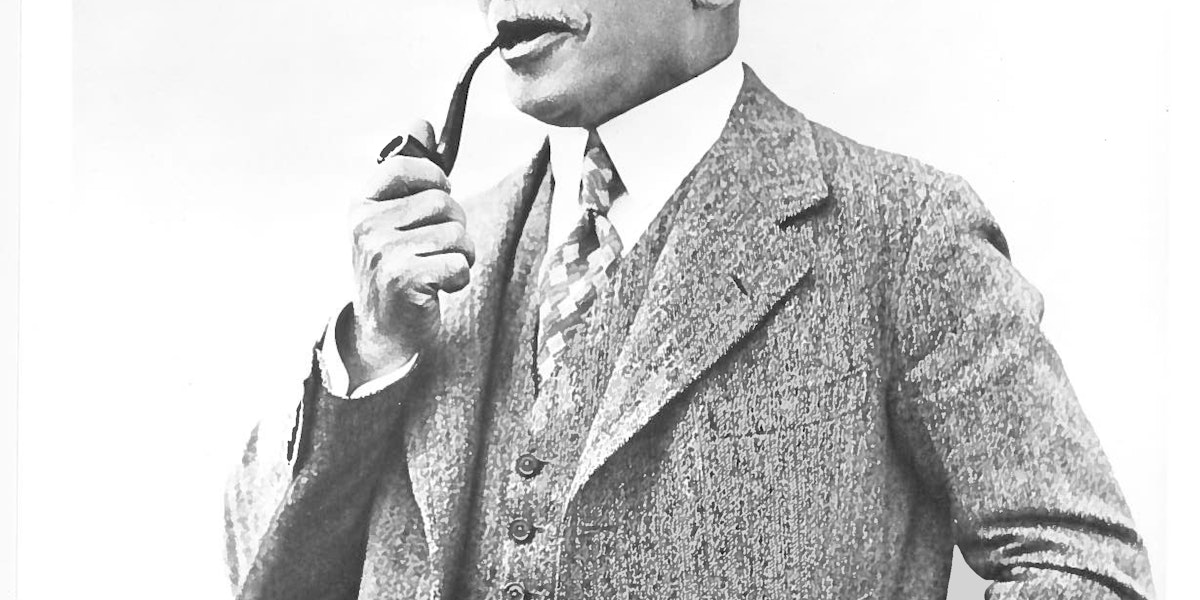 Edward A. Filene smoking a tobacco pipe