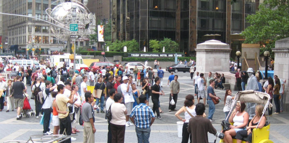 gathering of people at columbus circle in NYC