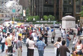 gathering of people at columbus circle in NYC