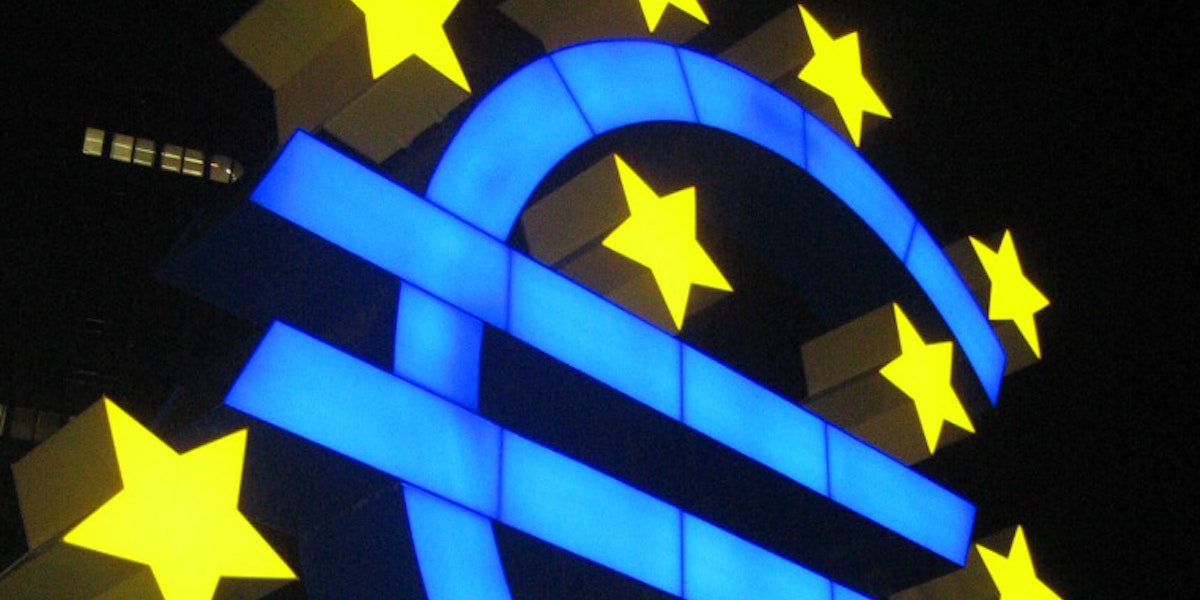 a blue and yellow sign with stars on it
