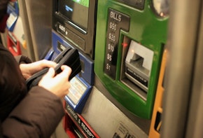 Woman Buying Metrocard - New York City