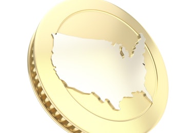a gold coin with the shape of the united states