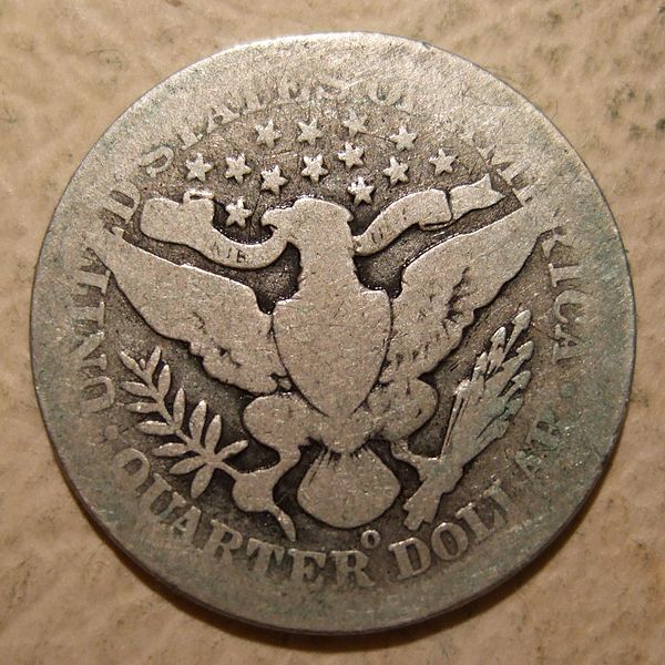 a close up of a coin on a table