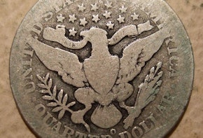 a close up of a coin on a table