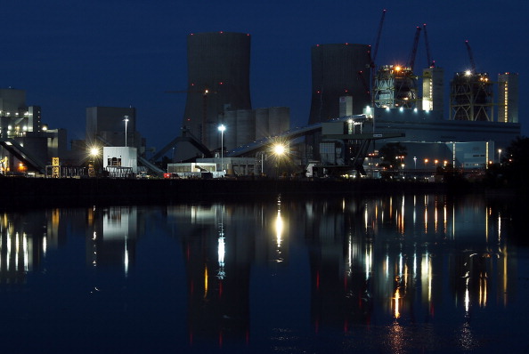 HAMM, GERMANY - MAY 23:  The Kraftwerk Westfallen coal-burning power plant stands illuminated on May 23, 2011 in Hamm, Germany. The plant, operated by German utilities giant RWE Power AG, was originally built in the 1970s, though two new additions under construction as part of a modernization effort will increase the plant's output by 1,600 Megawatts for a total capacity of 1,884 Megawatts. The future of Germany's energy supply is currently a hot topic of political controversy. The government has pledged to hasten the country's withdrawal from nuclear energy and pledged support for renewable energy sources, including solar parks, wind turbine farms and biomass projects, yet burning coal is and will remain the main means of electricity production for at least many decades to come.  (Photo by Lars Baron/Getty Images)