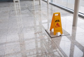 wet floor sign on lobby