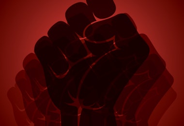 a red background with a black silhouette of a fist