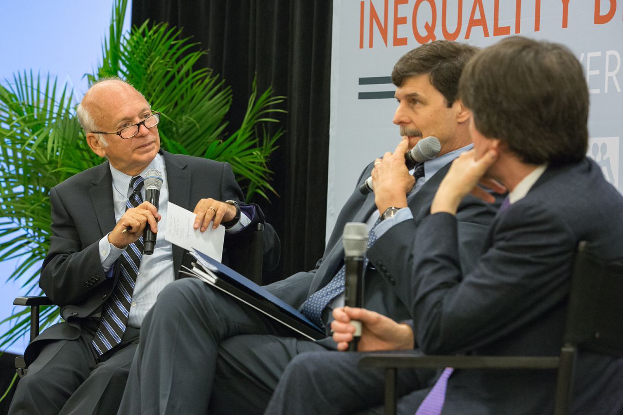 People speaking in a panel