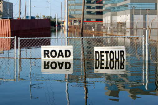 Photograph of a flooded urban street.