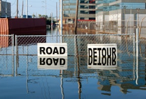 Photograph of a flooded urban street.