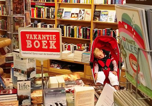 a group of people sitting at desks in the shape of a map
