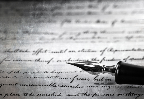 vintage pen on a handwritten paper