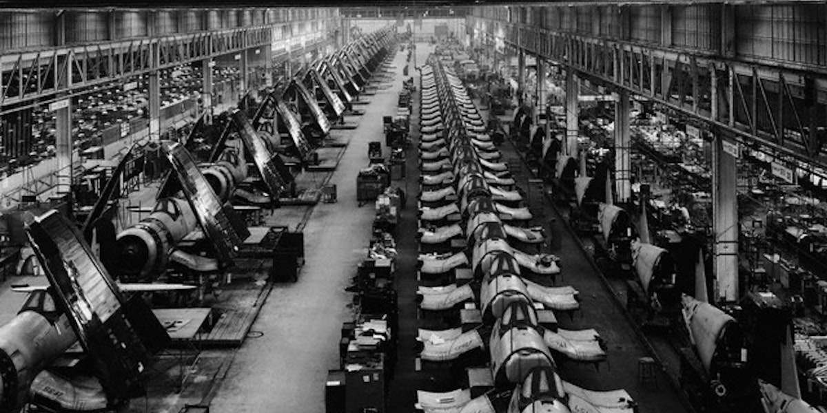 ca. 1939-1945, Stratford, Connecticut, USA --- Airplane factory in Stratford, Connecticut, World War II, which produced over 6,000 Corsairs- fighter planes with fold-up wings for use on board aircraft carriers. --- Image by © Bettmann/CORBIS