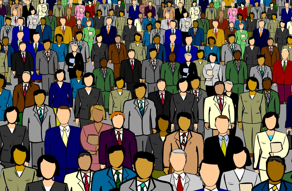 a large group of people standing in a crowd