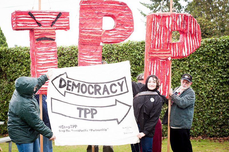 a group of people holding up a sign