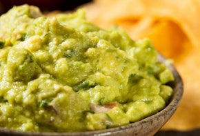 Green Homemade Guacamole with Tortilla Chips