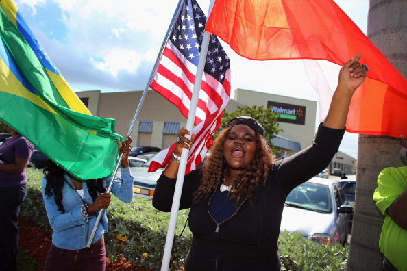 HIALEAH, FL - DECEMBER 14: Kishana Bennett and others participate in a 