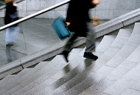 A person walking up the stairs