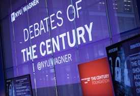 a large purple sign that says debates of the century