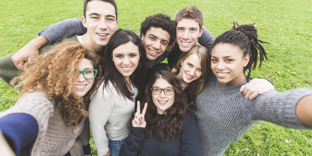 Multiethnic Group of Friends Taking Selfie at Park