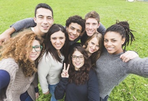 Multiethnic Group of Friends Taking Selfie at Park