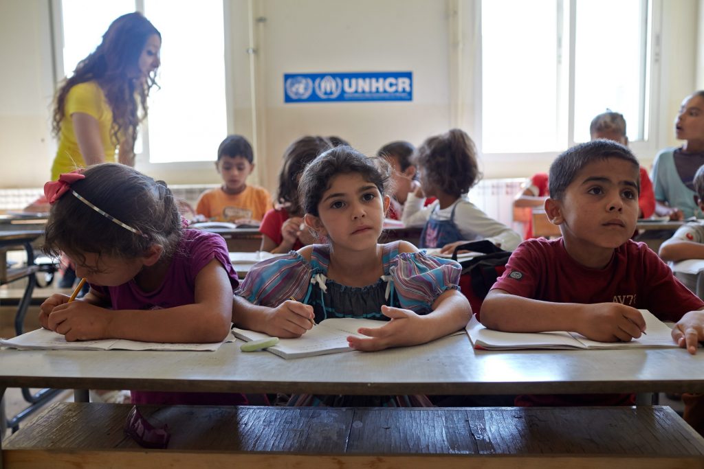 Syrian refugee students attend a class in an accelerated learning programme at public school in Kamed Al Louz in the Bekaa Valley, Lebanon. Source: Flickr, UNHCR/Photo by Shawn Baldwin