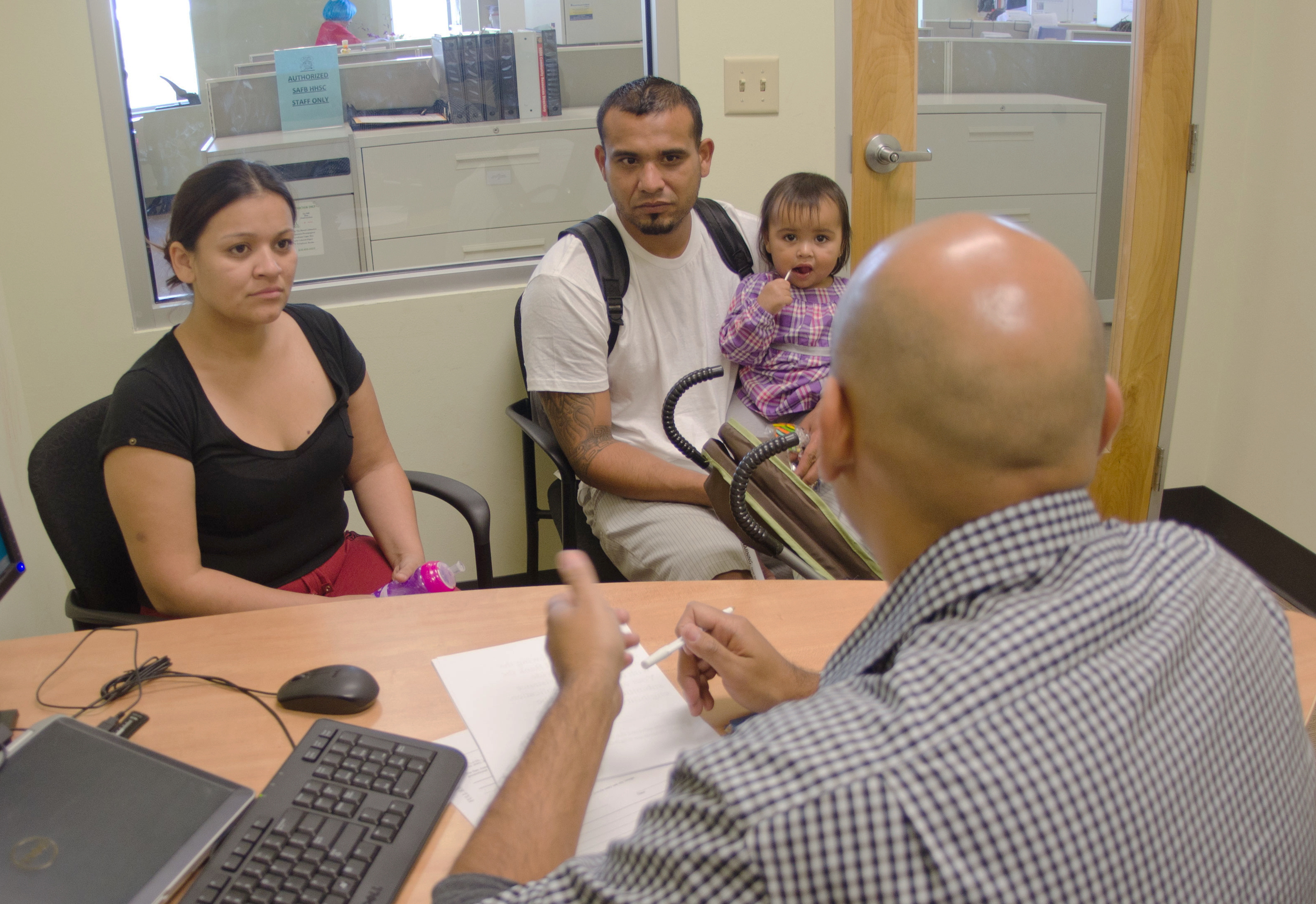 a family and counselor having a meeting