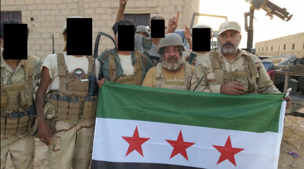 New Syrian Army troops. Third from right: Khaz'al al-Sarhan; Right: Lt. Col. Muhannad al-Talla'. Source: New Syrian Army Twitter.