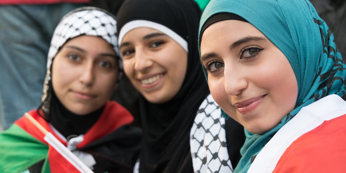 Philadelphia, PA, USA- July 27, 2014: Muslim young women posing at an anti Gaza Israeli bombardment demonstration at Philadelphia downtown