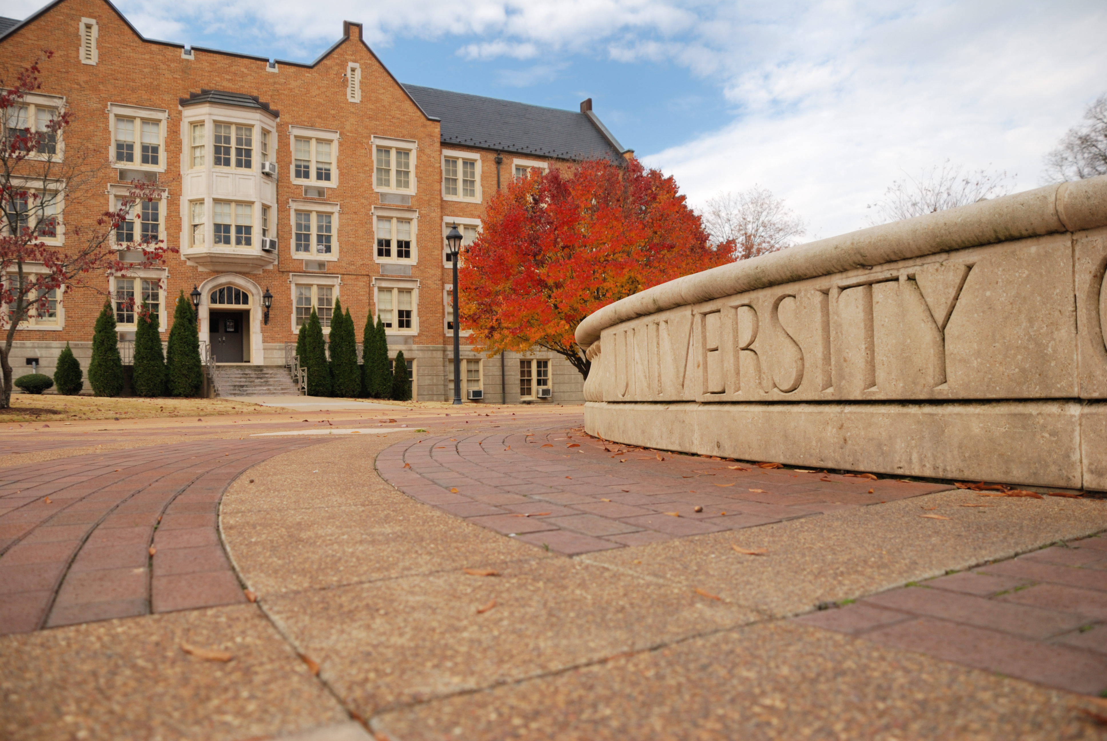 University sign and building