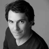 a black and white photo of a young man