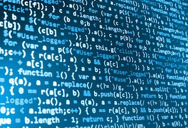 Software developer programming code on computer. Abstract computer script source code.