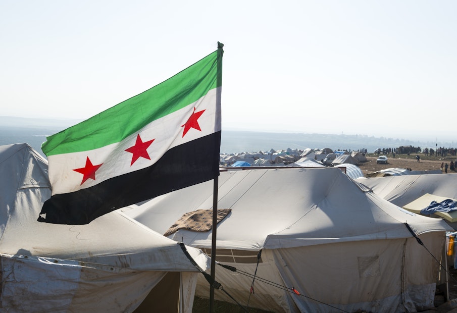 Free Syrian flag flying inside the camp for displaced persons at Atmeh, Syria