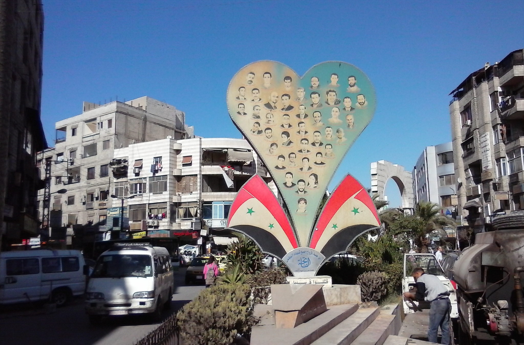 A monument to victims of a 2014 car bomb in President's Square in Jeremana, a Damascus suburb.