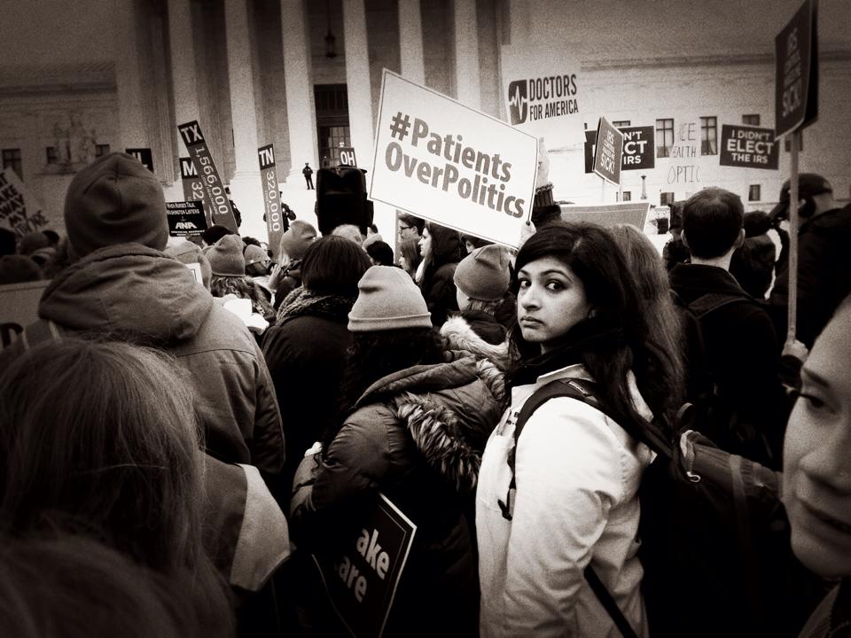A demonstration with a sign #patients over politics