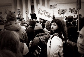 A demonstration with a sign #patients over politics