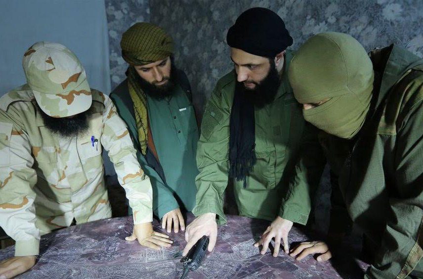 Fateh al-Sham Front head Abu Muhammad al-Jolani meets with commanders to discuss battle for Aleppo. Source: @dlockyer.