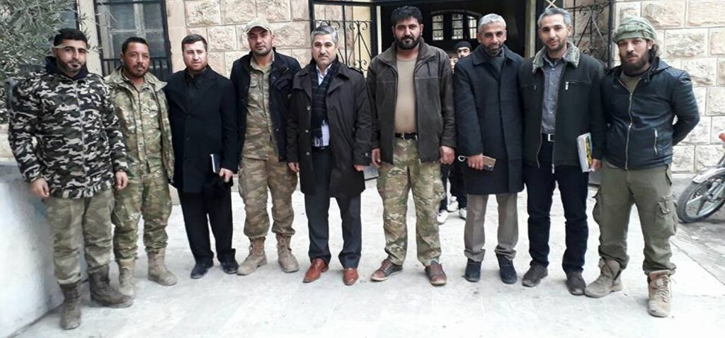Members of the Manbij Revolutionary Council meet with the education minister of the Syrian Interim Government in early 2017. © Facebook/Manbij Revolutionary Council