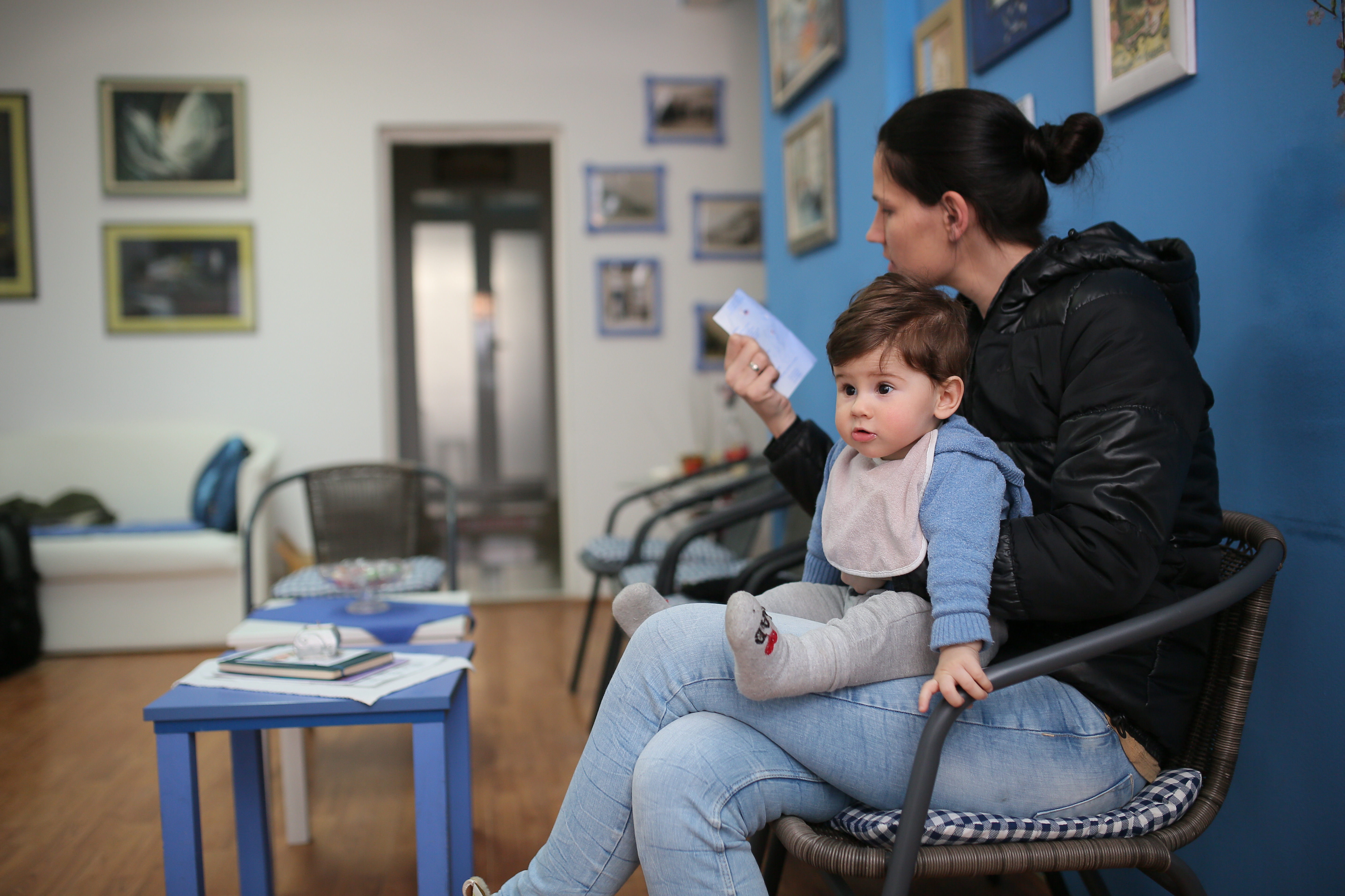 Young woman and her son at the doctor