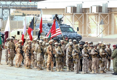 Soldiers from the United States, Kuwait, and other Gulf Cooperation Council (GCC) countries participate in the concluding drill of the wide-scale Eagle Resolve 2017 military exercise at Shuwaikh Port, west of Kuwait City on April 6, 2017.
About 1,000 US military personnel supported the month-long exercise which included a series of tactical demonstrations of land, maritime and air forces from several nations. / AFP PHOTO / Yasser Al-Zayyat        (Photo credit should read YASSER AL-ZAYYAT/AFP/Getty Images)