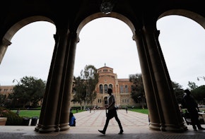 LOS ANGELES, CA - APRIL 23:  A student walks near Royce Hall on the campus of UCLA on April 23, 2012 in Los Angeles, California. According to reports, half of recent college graduates with bachelor's degrees are finding themselves underemployed or jobless.  (Photo by Kevork Djansezian/Getty Images)