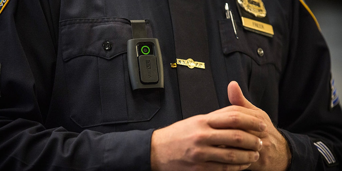 NEW YORK, NY - DECEMBER 03:  New York Police Department (NYPD) Sergeant Joseph Freer demonstrates how to use and operate a body camera during a media press conference on December 3, 2014 in New York City. The NYPD is beginning a trial exploring the use of body cameras; starting Friday NYPD officers in three different precincts will begin wearing body cameras during their patrols.  (Photo by Andrew Burton/Getty Images)