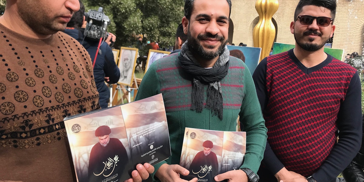 Majid Hamid and his companions distribute glossy fliers with Moqtada al-Sadr’s most recent pronouncements at the Baghdad Cultural Center