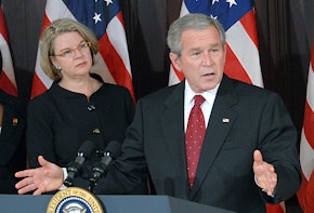 WASHINGTON  - SPETEMBER 27: U.S. President George W. Bush speaks before signing H.R. 2669, the College Cost Reduction and Access Act, as U.S. Secretary of Education Margaret Spellings listens at the White House September 27, 2007 in Washington, The act make college more affordable for low-income students by increasing funding for Federal Pell Grants by more than $11 billion.   (Photo by Ron Sachs-Pool/Getty Images)