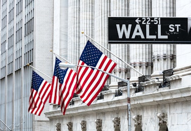 A photograph of a Wall St