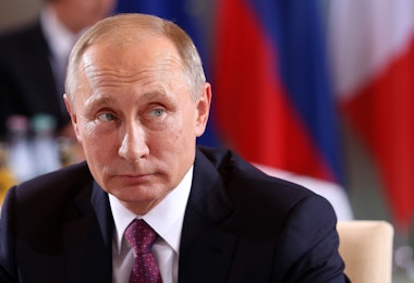 BERLIN, GERMANY - OCTOBER 19: Russian President Vladimir Putin attends a meeting to discuss the Ukrainian peace process at the German federal Chancellery on October 19, 2016 in Berlin, Germany. The leaders of Russia, Ukraine, France and Germany, known as the Normandy Four, met in Berlin to discuss implementation of the peace plan known as the Minsk Protocol, a roadmap for resolving the conflict in Ukraine after Russian forces invaded in 2014 and annexed the peninsula of Crimea. The United States has threatened renewed sanctions on Russia if the country did not either implement the plan in the coming months or arrive at a plan on how to do so. (Photo by Adam Berry/Getty Images)